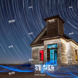 Abandoned Taiban Presbyterian Church in New Mexico at night with star trails.